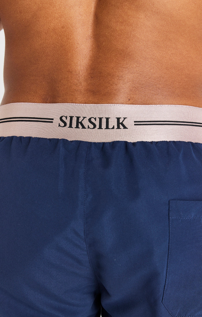 Laad de afbeelding in de Galerij viewer, Pantalón corto SikSilk Supremacy - Azul marino y oro rosa (1)
