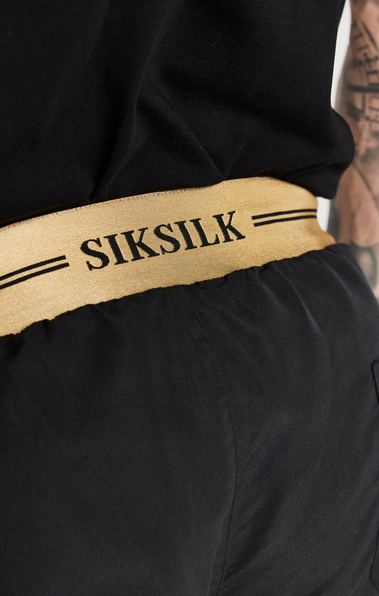 Pantalón corto SikSilk Supremacy - Negro y dorado