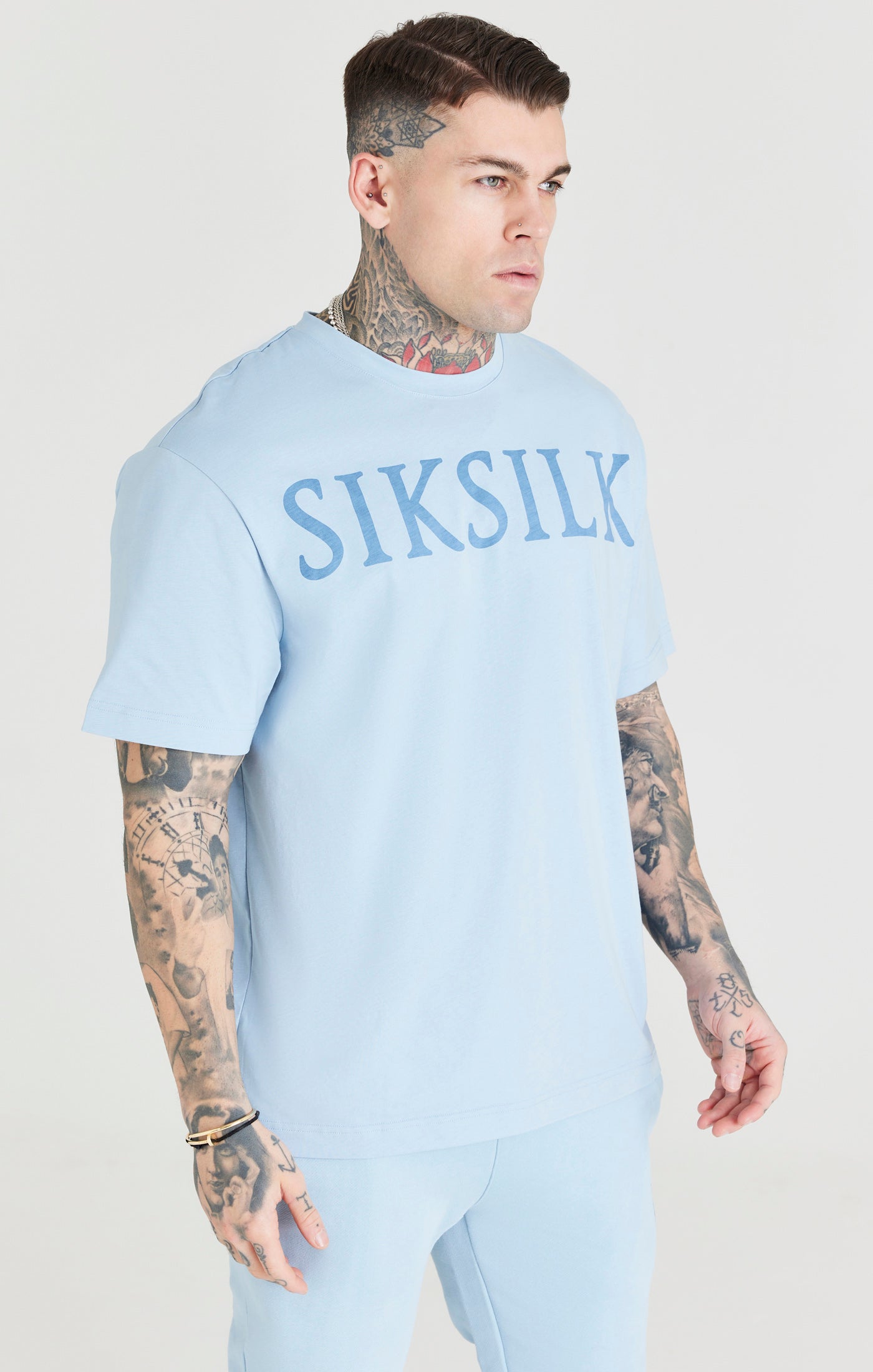 Cargar imagen en el visor de la galería, Camiseta extragrande SikSilk con logotipo - Azul (4)