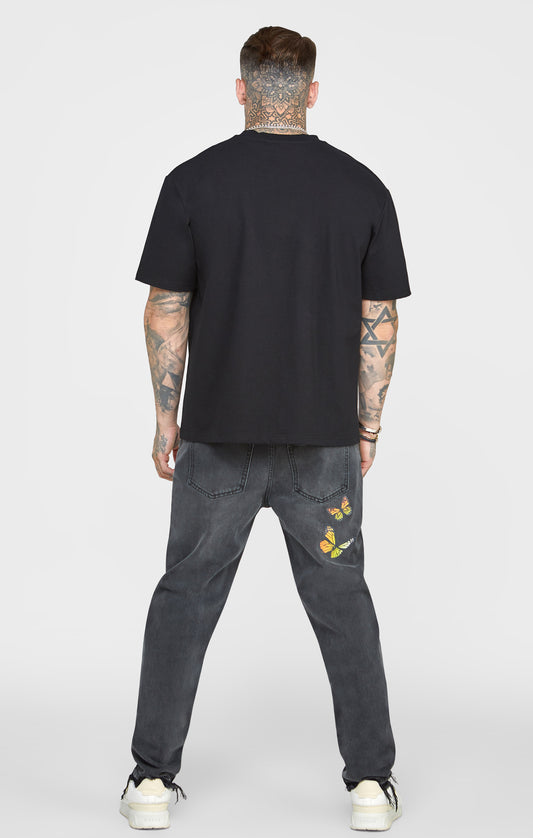 Camiseta Oversize Mariposa Negra